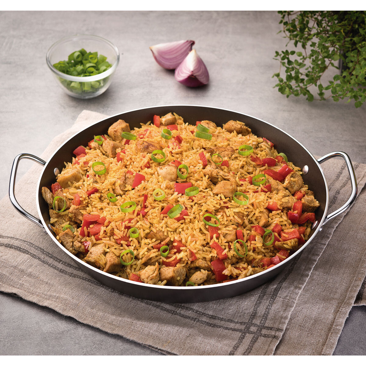 Buy now from NonynanaEssential  Tramontina Non-Stick 34Cm Paella Pan Tramontina